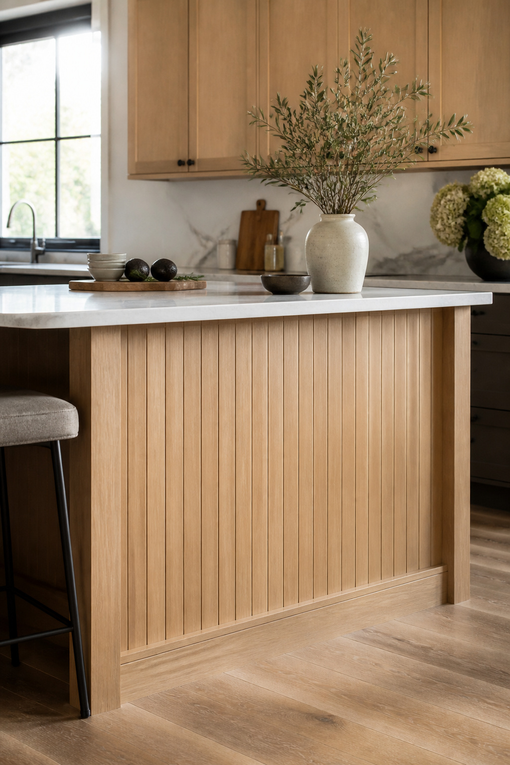 A kitchen cabinet with a beaded board back panel.